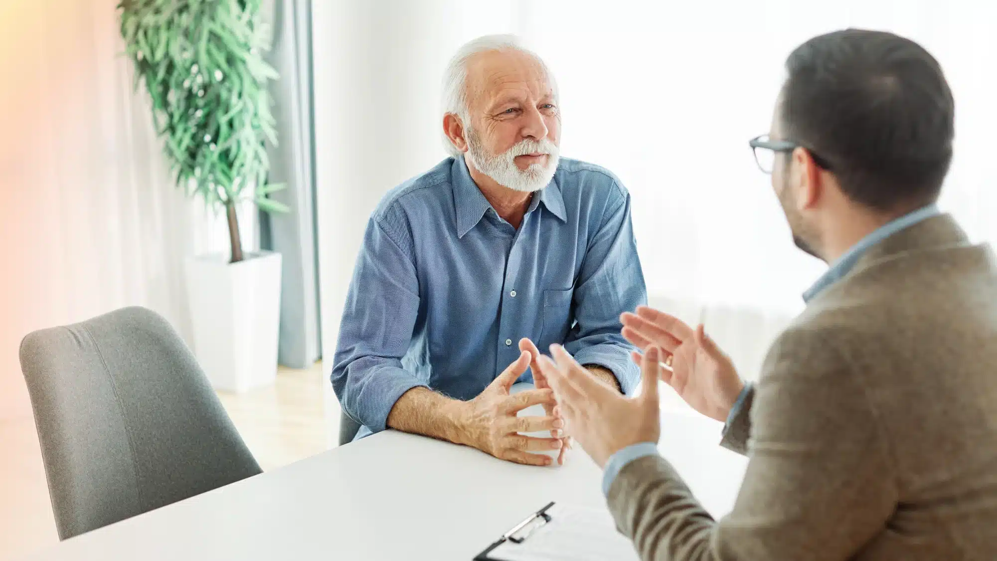 understanding-what-a-medicare-advantage-plan-covers-including-benefits-services-and-limitations Senior reviewing Medicare Advantage plan coverage details including benefits, services, and limitations for healthcare insurance planning