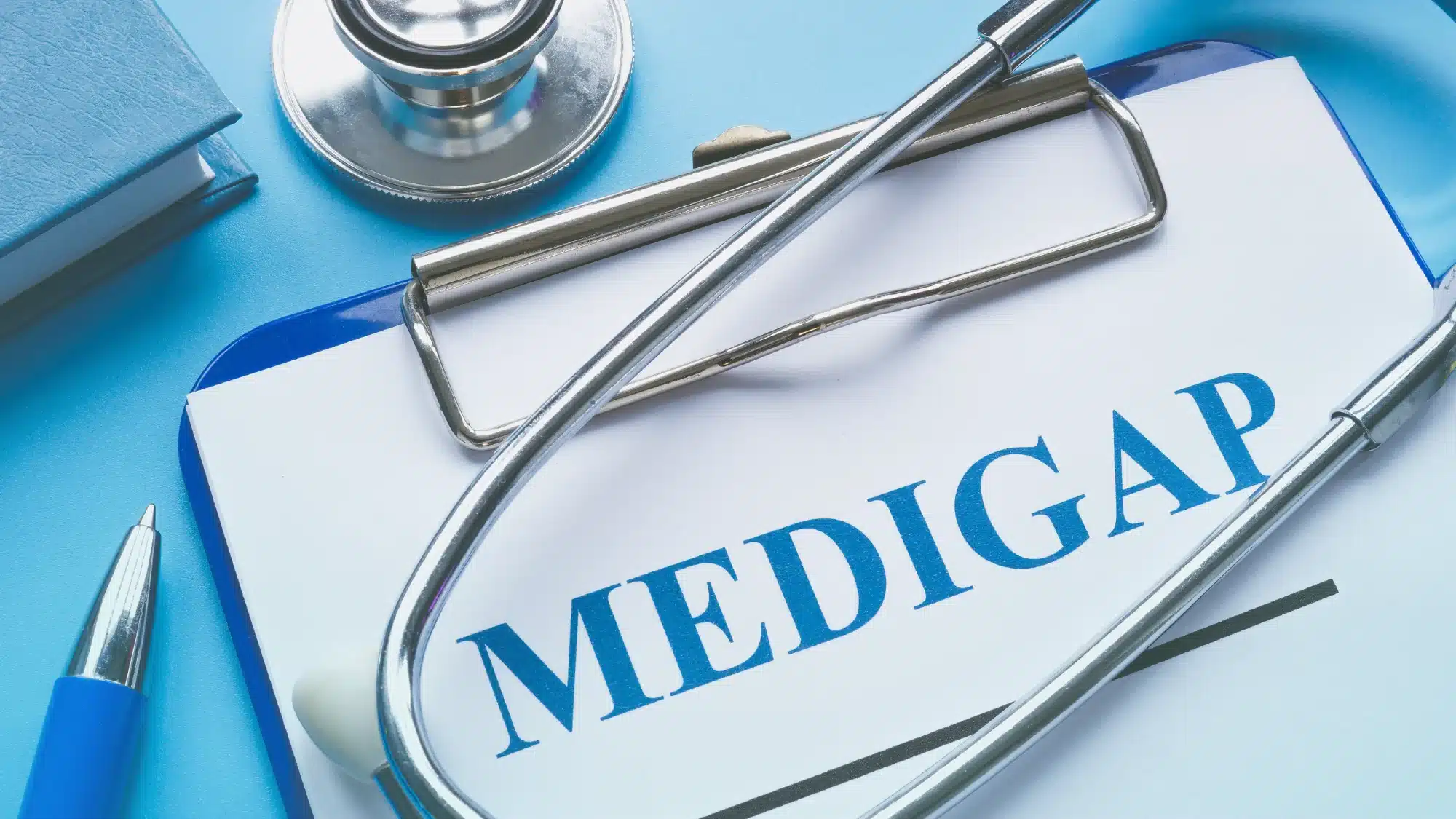 how-niantic-ct-residents-can-compare-available-medigap-insurance-plans-for-better-coverage Senior in Niantic Connecticut comparing Medicare Supplement (Medigap) insurance plans using documents and a comparison chart with coverage options and costs