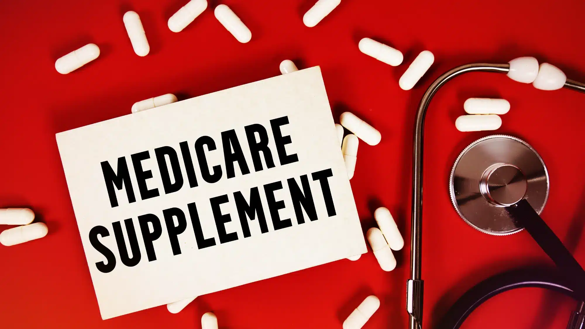 understanding-the-medicare-supplement-plan-options-available-to-residents-in-andover-ct Senior reviewing Medicare Supplement Plan options in Andover Connecticut with comparison charts explaining Medigap coverage and benefits